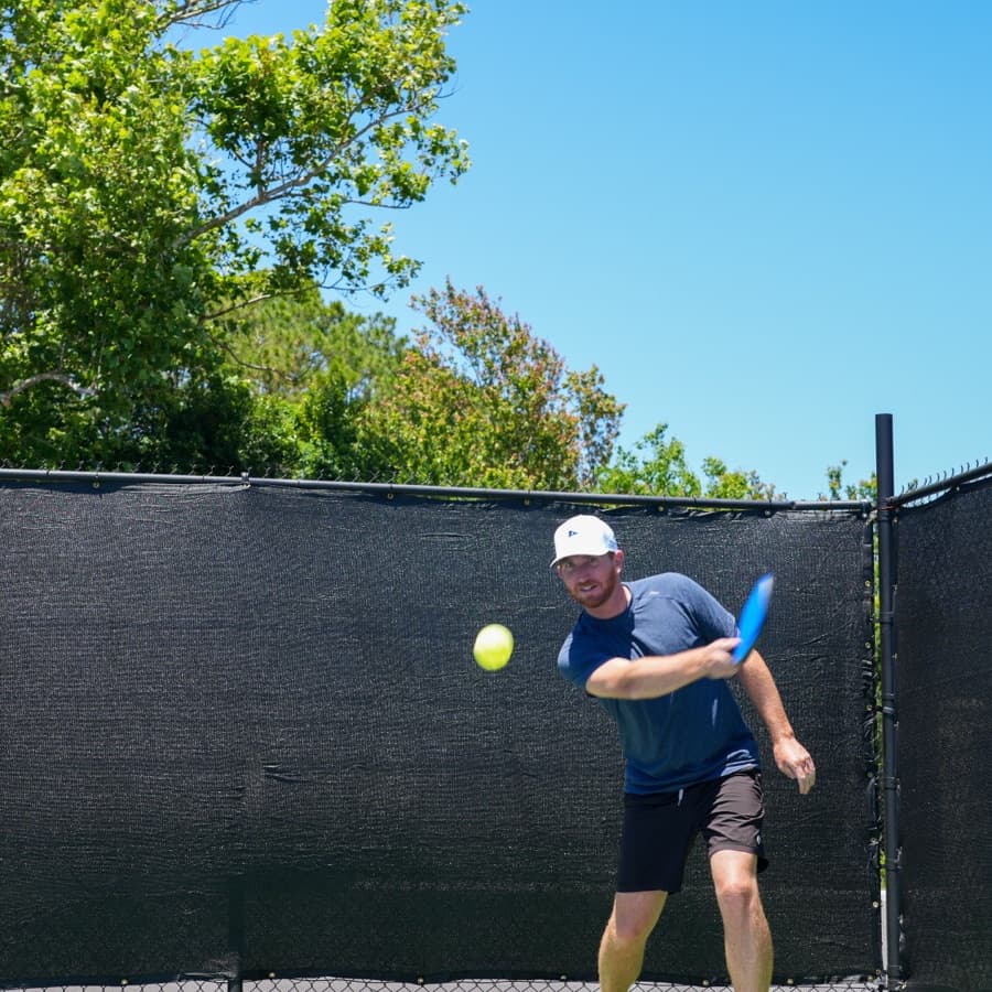 A player returning the ball at Golf Pub Social