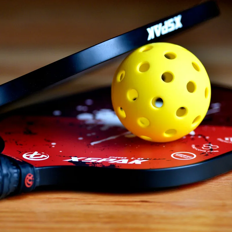 Pickleball paddle and ball